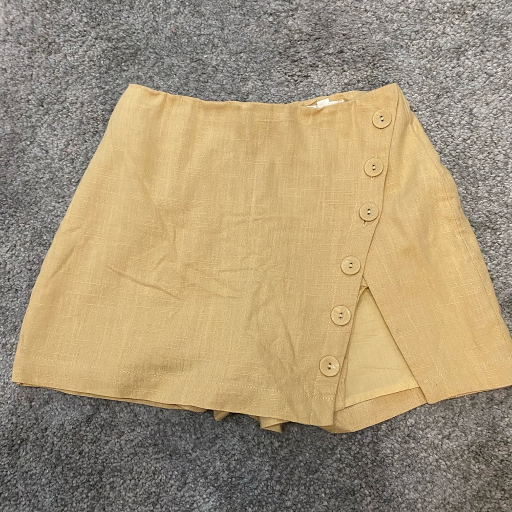 tan slit skort with buttons